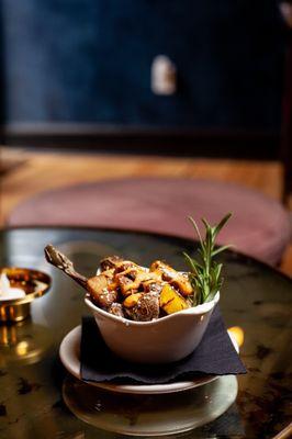 Chicken and Rosemary Petite Potato bowl. Small bites crafted to pair with signature cocktails. Kitchen open til midnight.