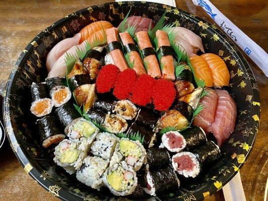 Sushi Party C- Tuna roll, salmon roll, eel roll, California roll, 4 yellowtail sushi, 4 tuna sushi, 4 salmon sushi, 4 crab stick sushi, 4 ee