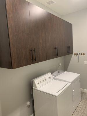 We can do custom cabinets in your laundry room as well!