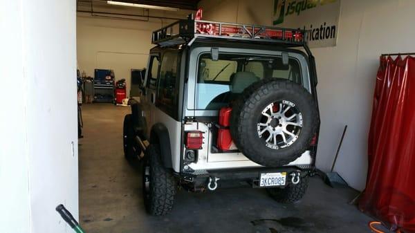 Custom exo rack fabricated and powdercoated for 95 jeep