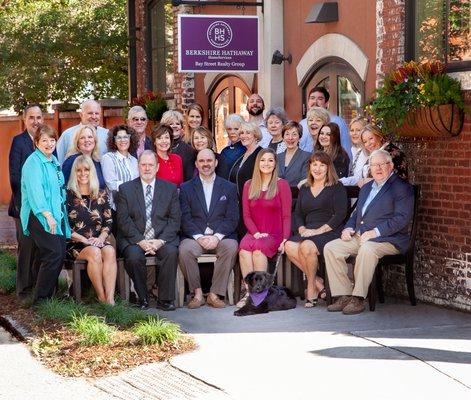 Our agents and staff with out office pup Bear!