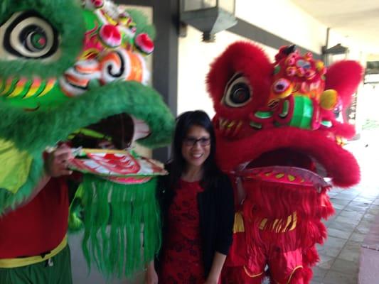 Kimberley Woo with two Lucky Lions from the Grand Opening celebration.