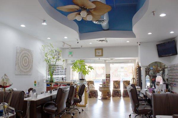 Shop interior, showing manicure stations and waiting area.