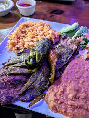 Carne asada (has grilled jalapeno and nopales, refried beans, and Spanish rice)