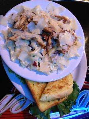 Smoked chicken penne with Alfredo sauce, spinach and cranberries... covered with shaved Parmesan. This is an airport restaurant?