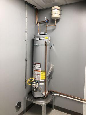 Skinny heater with expansion tank installed - Spectrum store