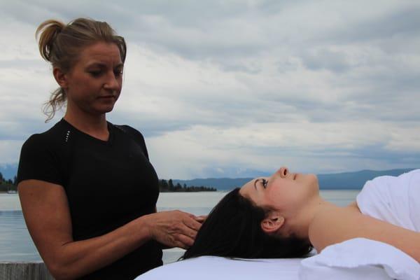 Heather Reddig owner of Aqua Marine Massage offers massage therapy from the deck of her pontoon boat on Flathead Lake.