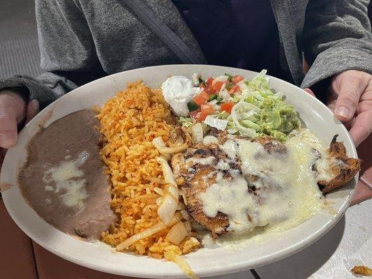 Lunch Mini Pechuga Asada, grilled chicken covered in Monterey Jack cheese.