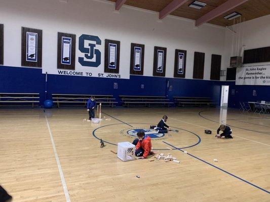 Kindergarteners Distance Playing in gym - 2021