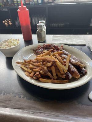 Pulled pork, jalapeño cheddar sausage links, fresh cut, fries, and coleslaw