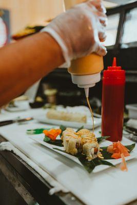 Breakfast Roll - Smoked Salmon, Cream Cheese topped with Eel Sauce & Spicy Mayo. ( Deep Fried )