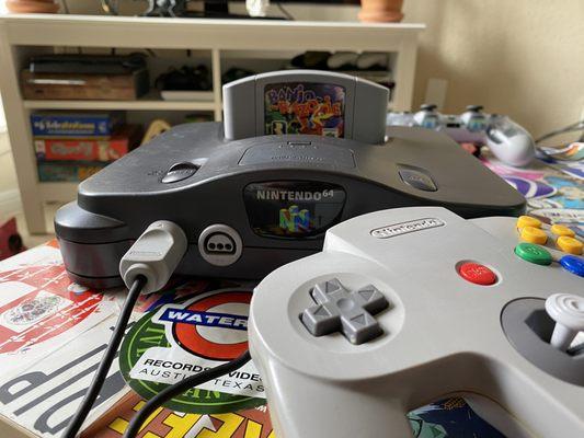 Nintendo 64 with controller included, plus I bought banjo kazooie. N64 was insanely great condition