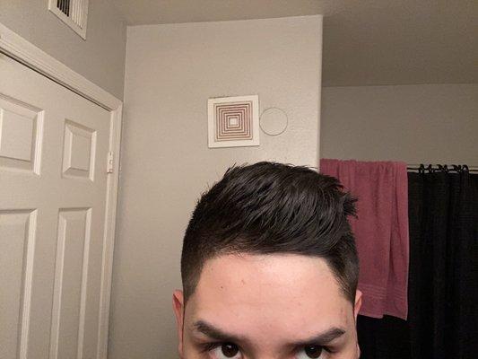 Messed up hair line not even straight.