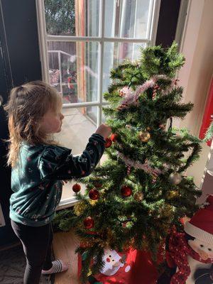 Santa's little helpers decorated our school Christmas tree!