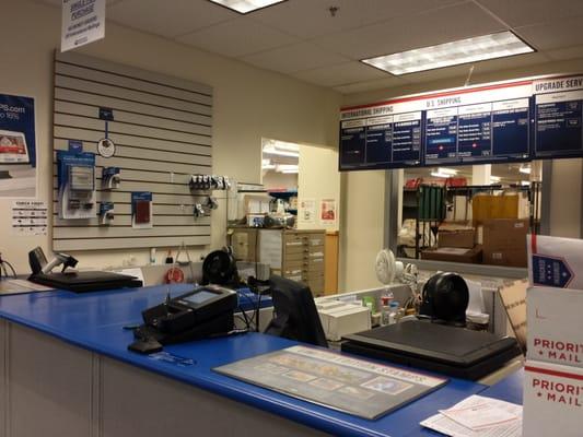 The inside of the post office.