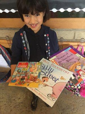 Alana donated 3 books to Mrs Markham's first grade class this morning!!!