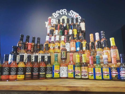 Large section of of favorite hot sauces.