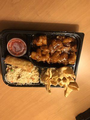 Orange chicken, fried rice, egg roll, crab rangoon