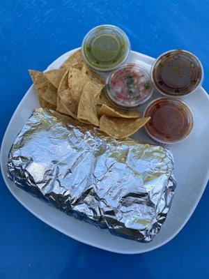 Gigantic burrito came with chips and serve-yourself salsa.