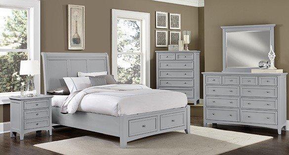 Vaughan Bassett queen bed with storage footboard, dresser, mirror chest and night stand