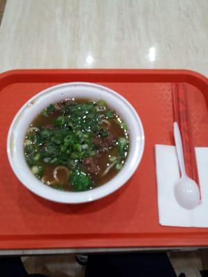 This beef noodle soup looks nothing like the display menu version. ($5.50)