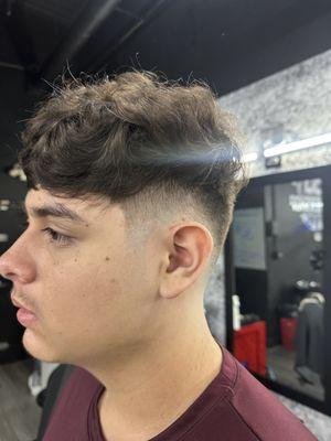 Low skin taper fade