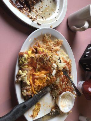 Omelette and hash browns and steak