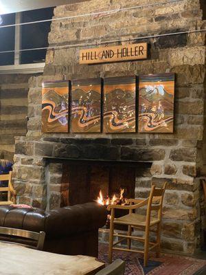 Huge fireplace with sitting area.