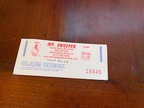 The claim ticket that was given to me when I dropped off the blue Miele