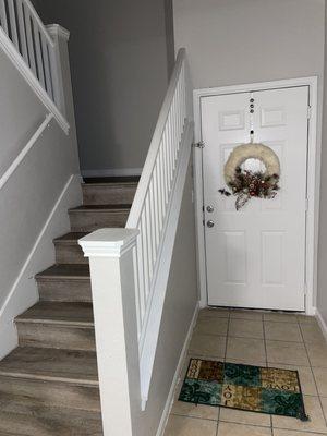 Front entry/stairway leading to loft area