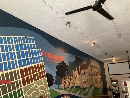 Taproom with mural.