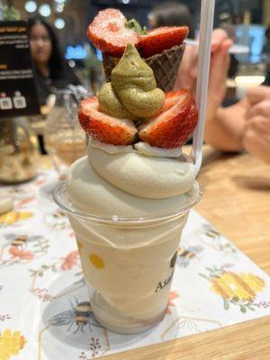 Soft serve (vanilla & chocolate) with pistachio cream and honey comb, which is inside the cone