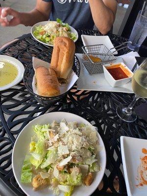 Two Cesar salads, the complimentary bread and oil and herb mix they give and some mozzarella sticks to start.