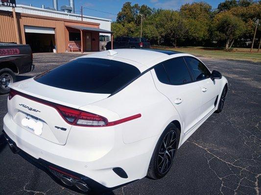 This 2021 Kia stinger was Already a work of art. With a little help from our window film, we were able to turn it into a masterpiece.