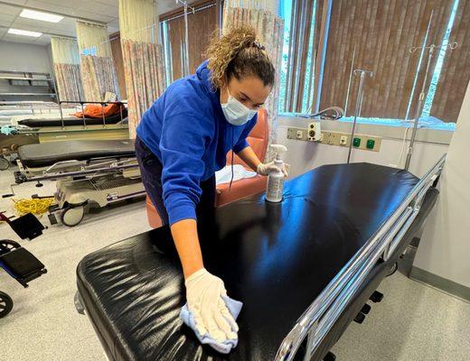 Cleaning and disinfecting a medical clinic.