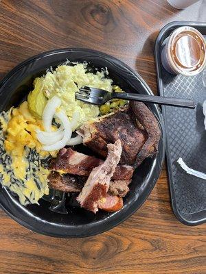 BBQ chicken, Mac n cheese, brisket, ribs, potato salad and jalapeño cheese sausage