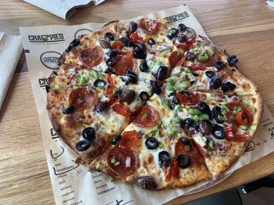 Pepperoni, black olives, green peppers, onions