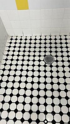 Theyre getting cleaner! The mens shower floors