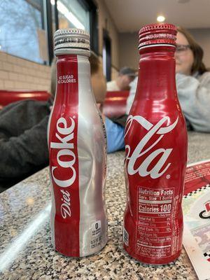 Coke bottles turned into Salt and Pepper shakers.