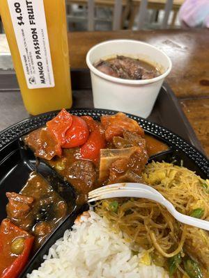 Platter with SQUID ADOBO and Goat Kaldereta, rice noodles and steamed rice.