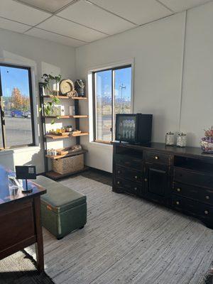 Reception Area with complimentary water, snacks, and tea