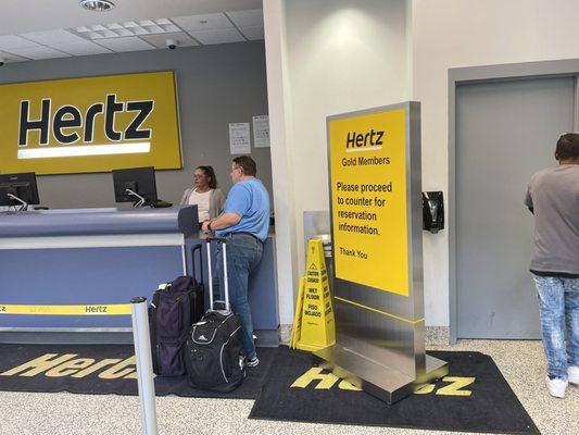 Hertz Counter at the airport.  Notice the sign for Gold members.