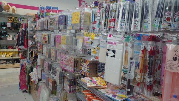 Origami paper and calligraphy tools.