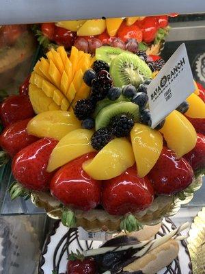 $19.99 fruit tart with Bavarian cream and a thin layer of chocolate cake