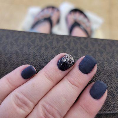 Stunning matte navy with a gold ombre accent nail.