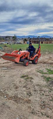 Ezequiel hard at work clearing my property