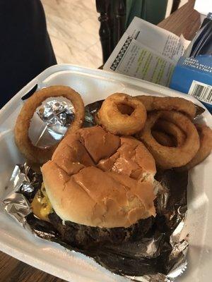 Burger with American cheese and onion rings