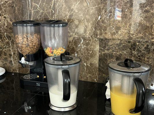 Cereal, milk and OJ for breakfast