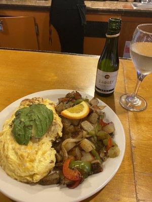 Shrimp omelette without hash browns and toast. Champagne to top it all off!