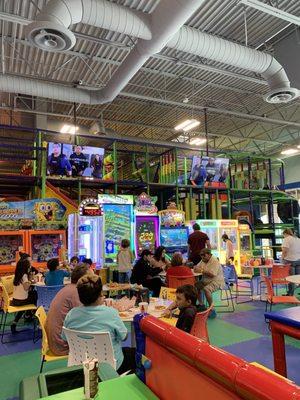 Parent seating, games and large play area.